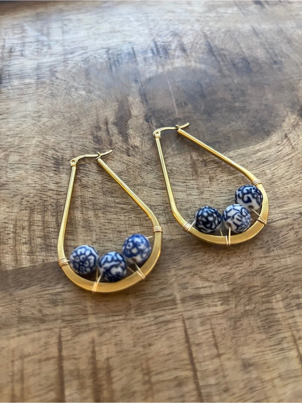 chinoiserie gold hoop earrings